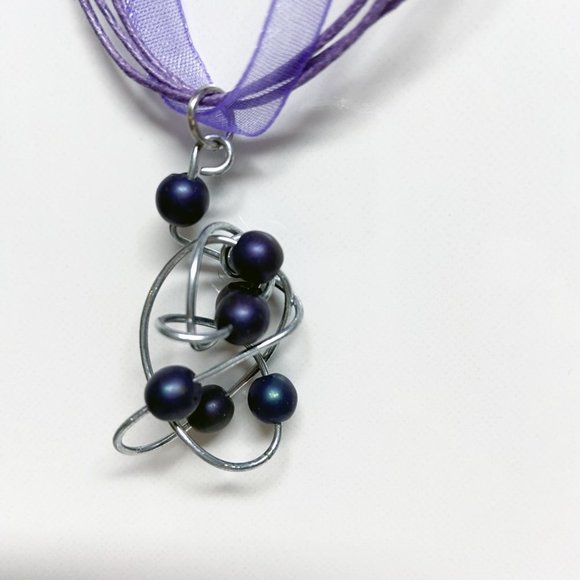 Stainless Steel Twisted Pendant with Druk Beads Handcrafted by Artisan - Picture 4 of 9